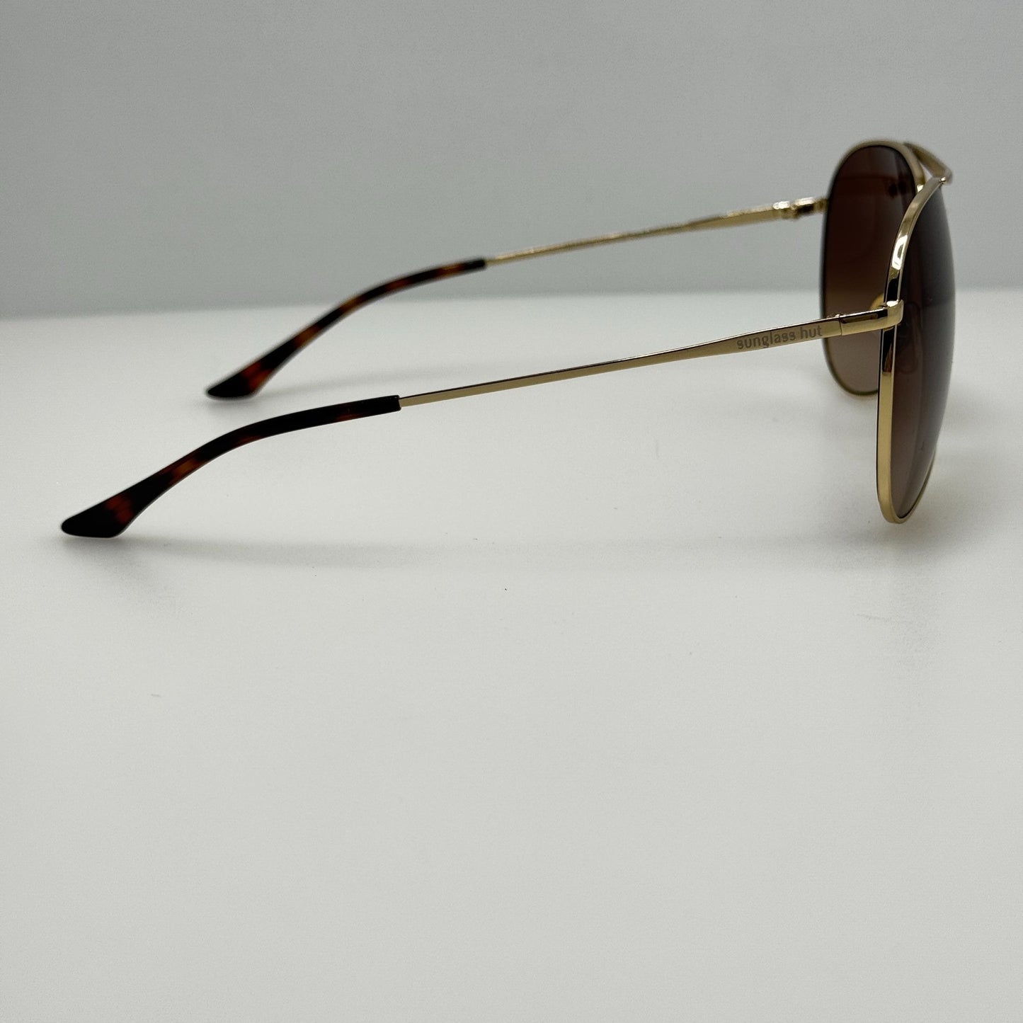 Sunglass Hut Sunglasses HU 1006 007/13 64-11-140